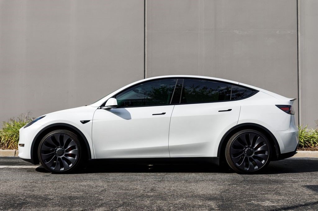 Used 2025 Tesla Model Y Performance with VIN 7SAYGDEF7SA344898 for sale in Orlando, FL
