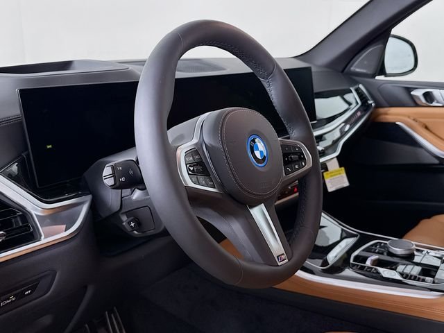 New 2026 Black Sapphire Metallic BMW xDrive50e image 11
