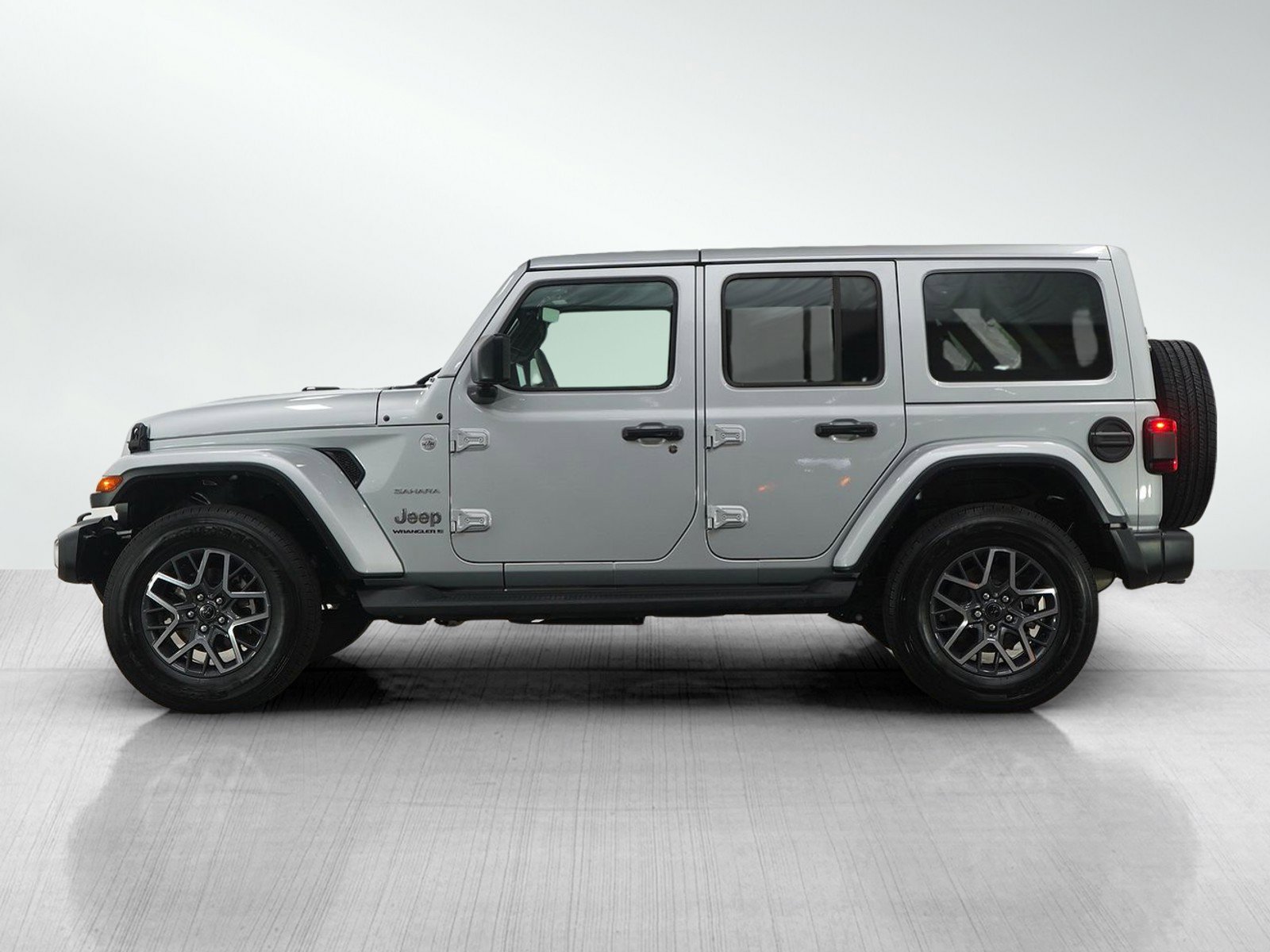 Used 2024 Jeep Wrangler 4-Door Sahara with VIN 1C4PJXEN9RW154869 for sale in Minneapolis, Minnesota