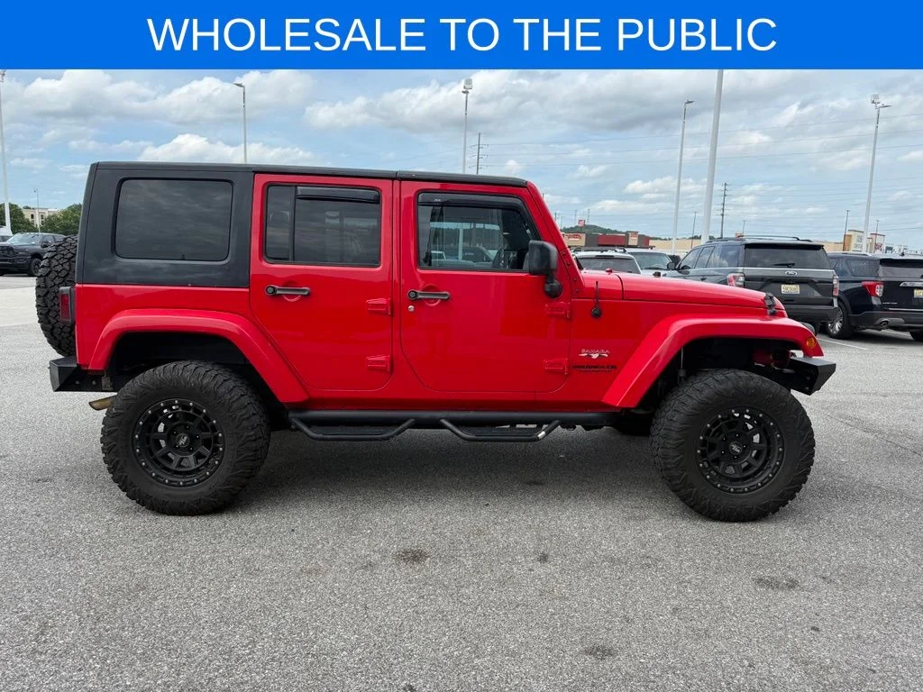 Used 2016 Red Jeep Unlimited Sahara image 24