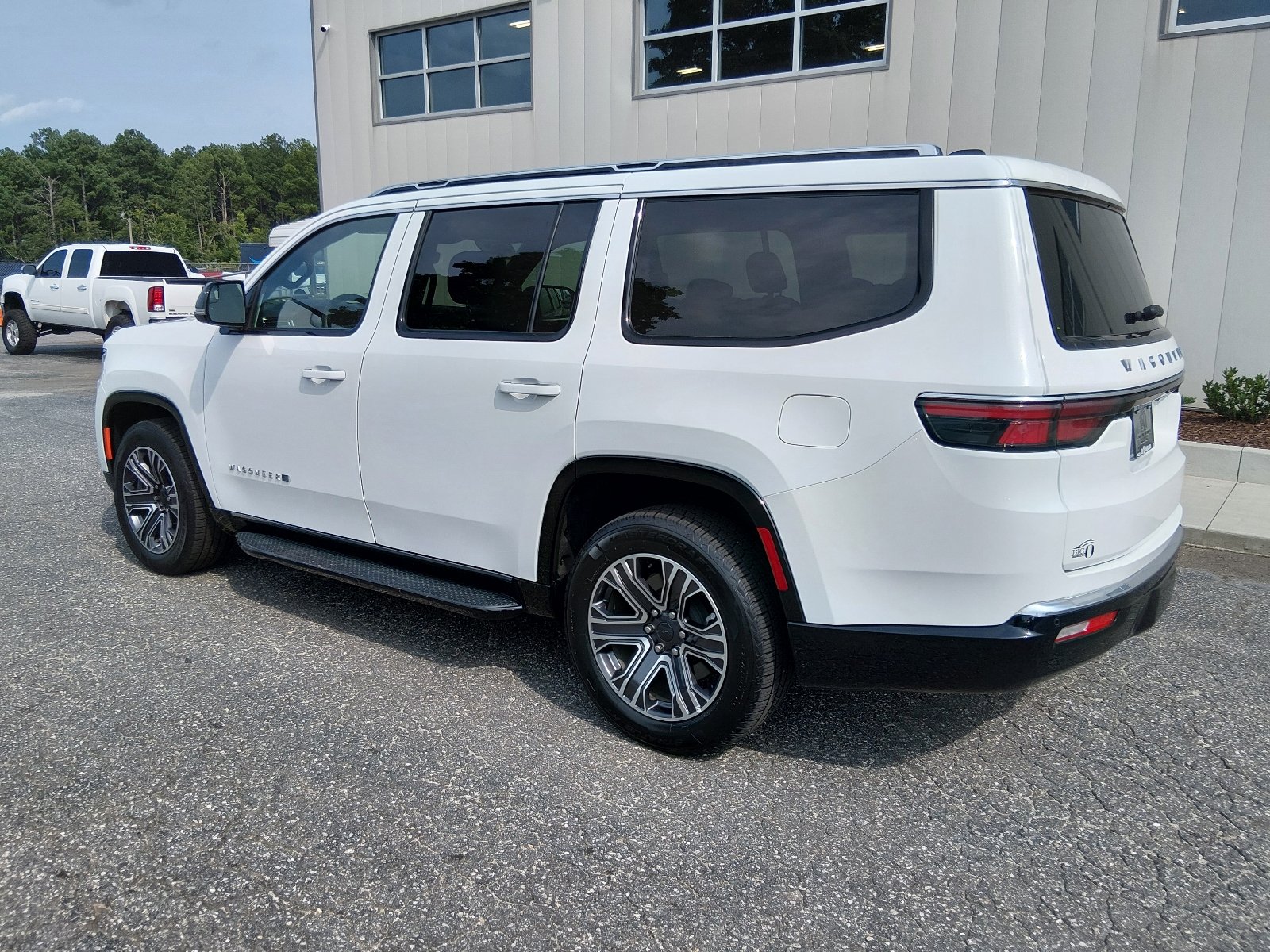 Used 2024 Bright White Clear Coat Jeep Series II image 5