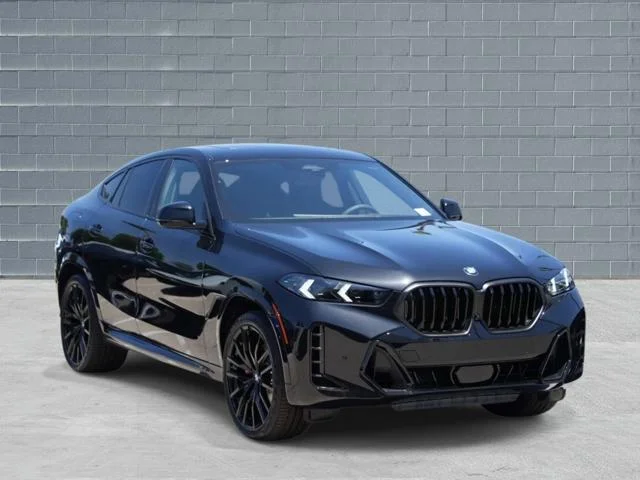 Used 2027 Black Sapphire Metallic BMW xDrive40i Sports Activity Coupe image 1