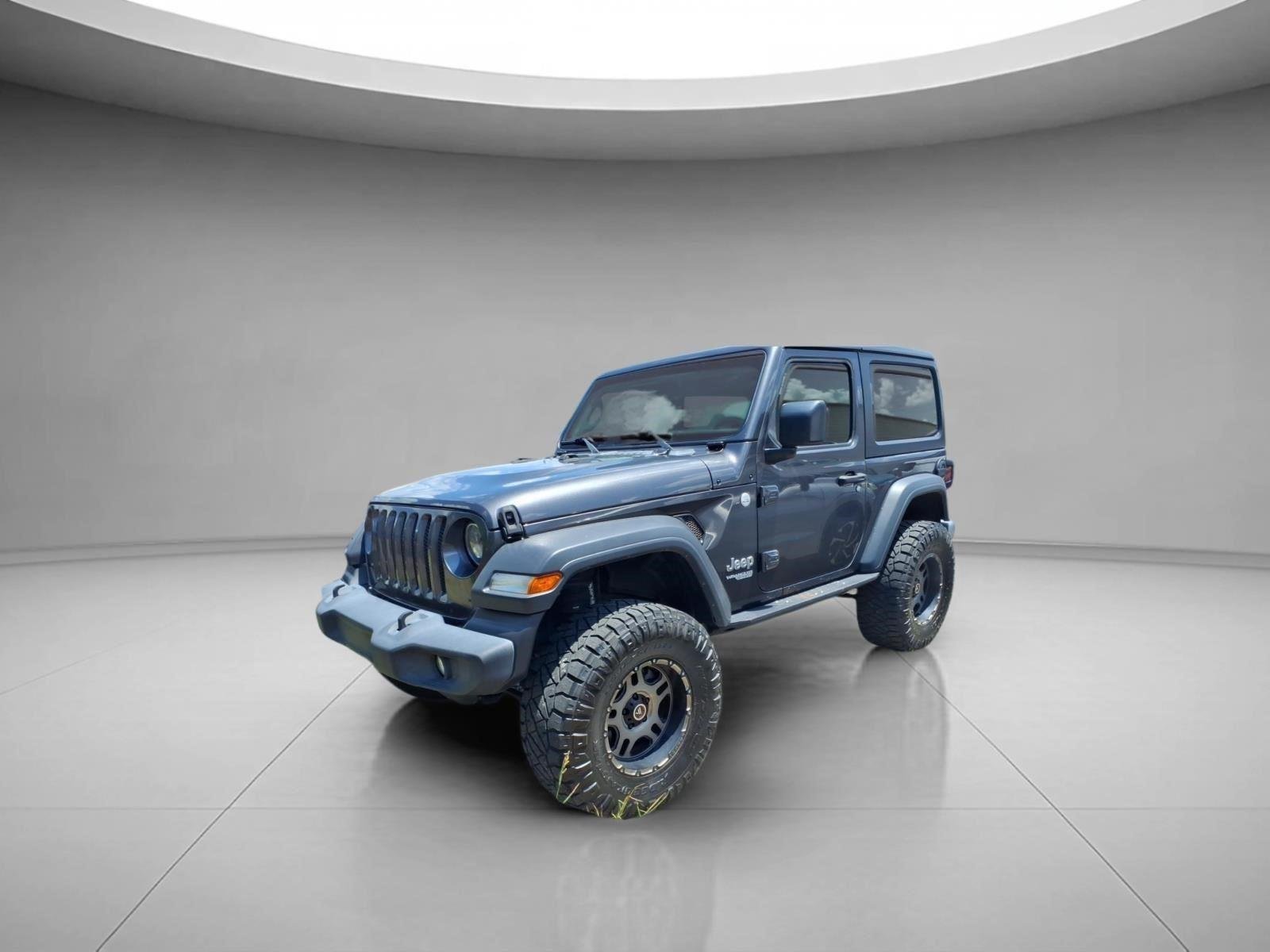 Used 2018 Granite Crystal Metallic Clearcoat Jeep Sport S image 1