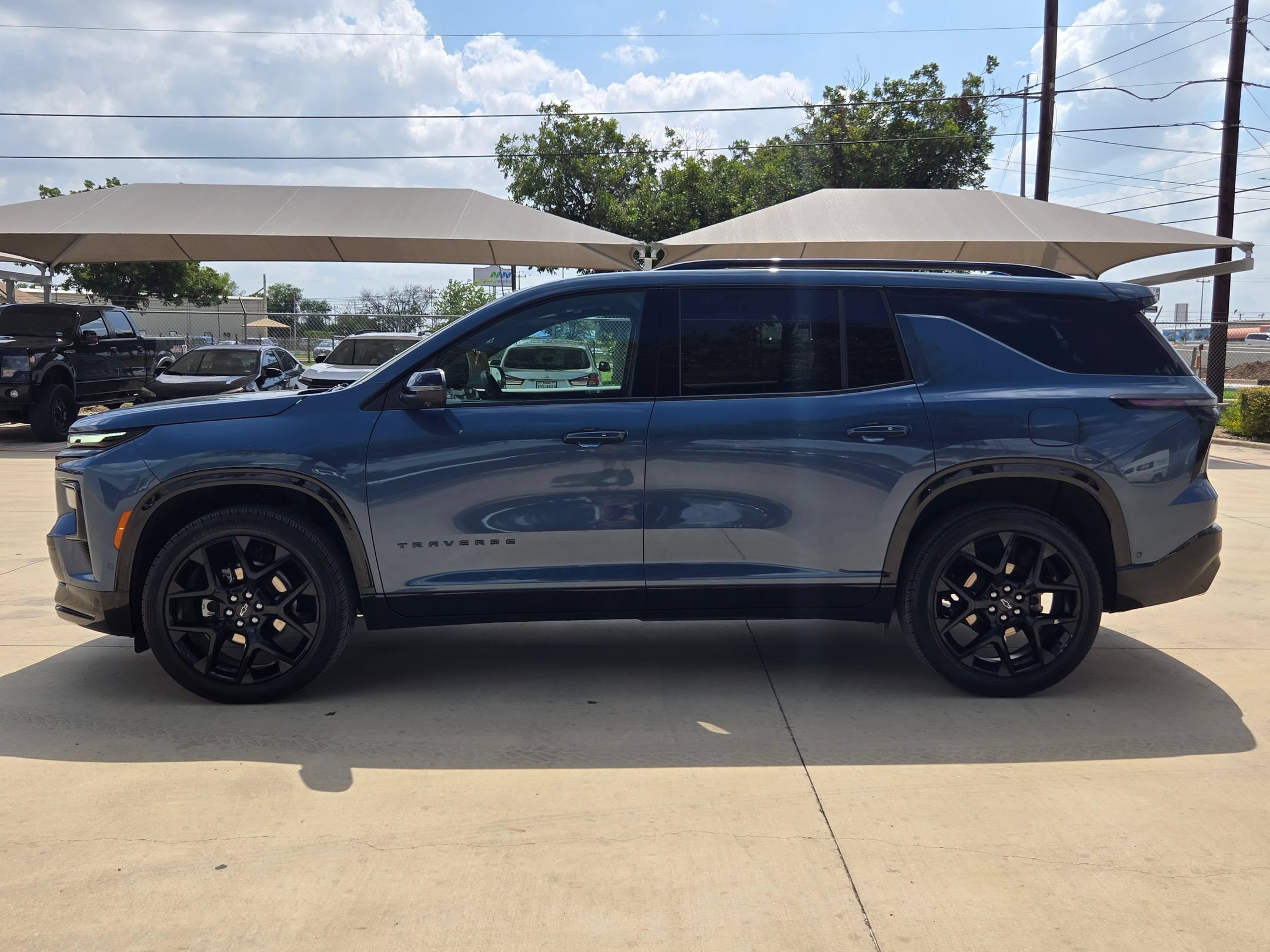 Used 2025 Lakeshore Blue Metallic Chevrolet AWD RS image 4