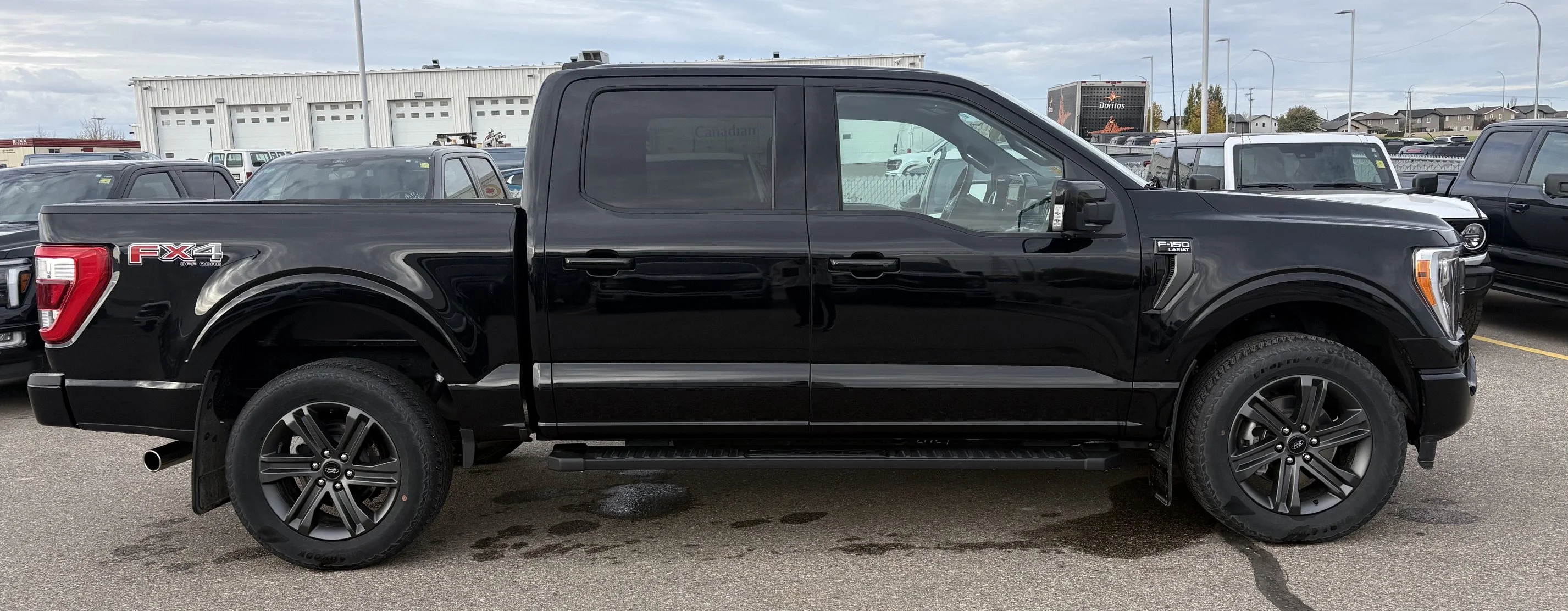 Used 2023 BLACK Ford LARIAT SuperCrew   **New Arrival** image 6