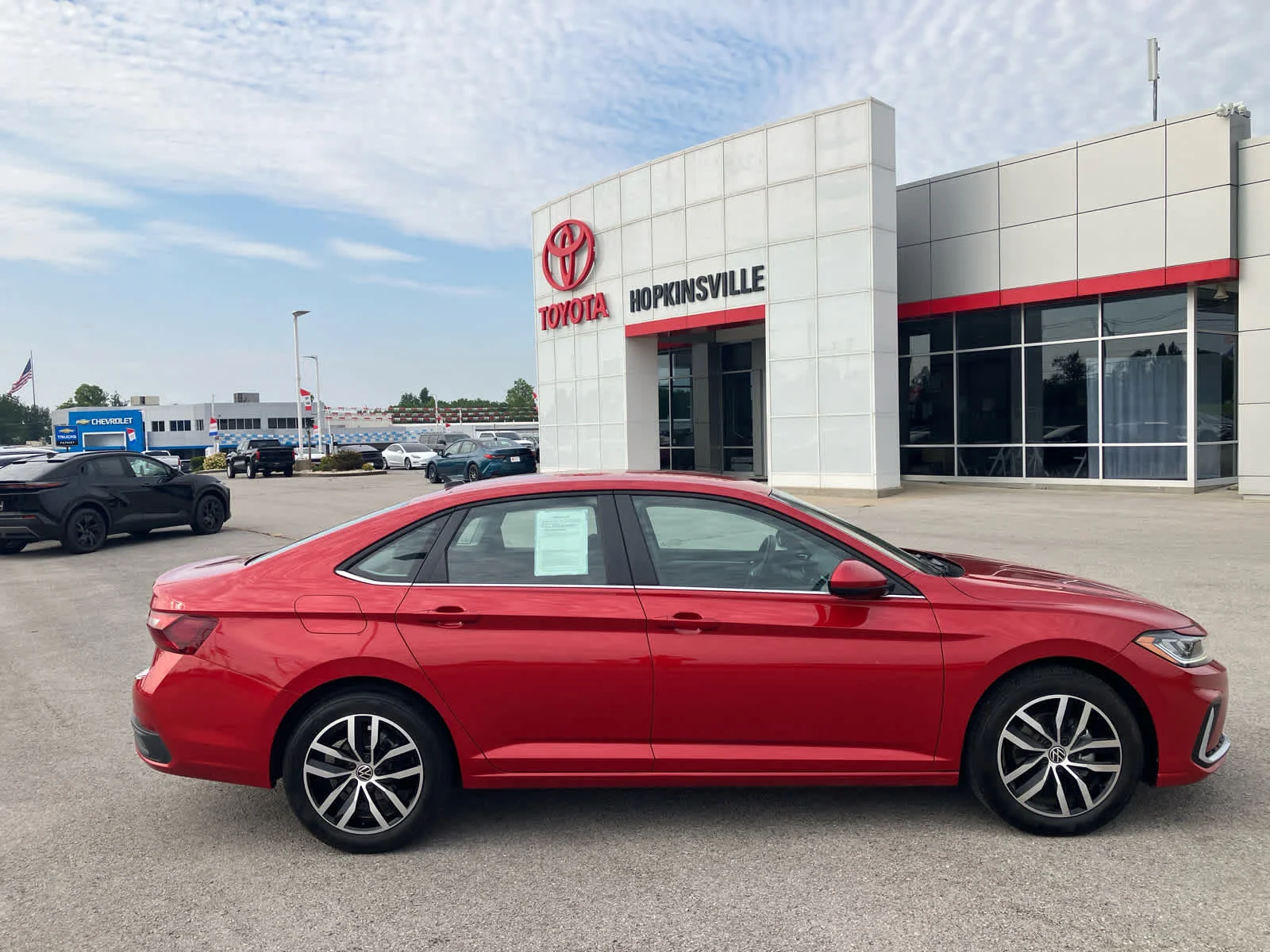 Used 2025 Kings Red Metallic Volkswagen SE image 8