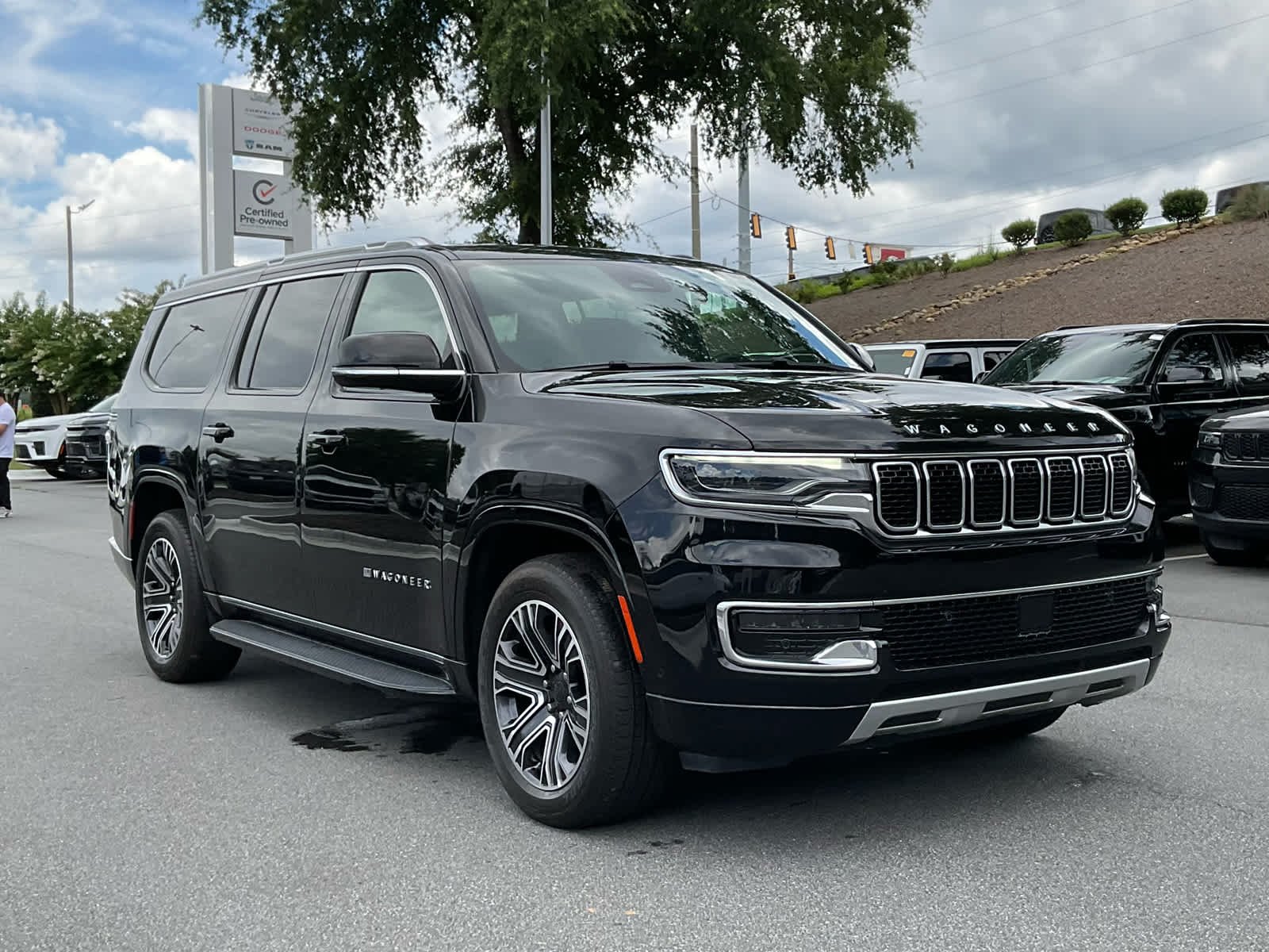 Used 2024 Diamond Black Crystal Pearlcoat Jeep Series II image 3
