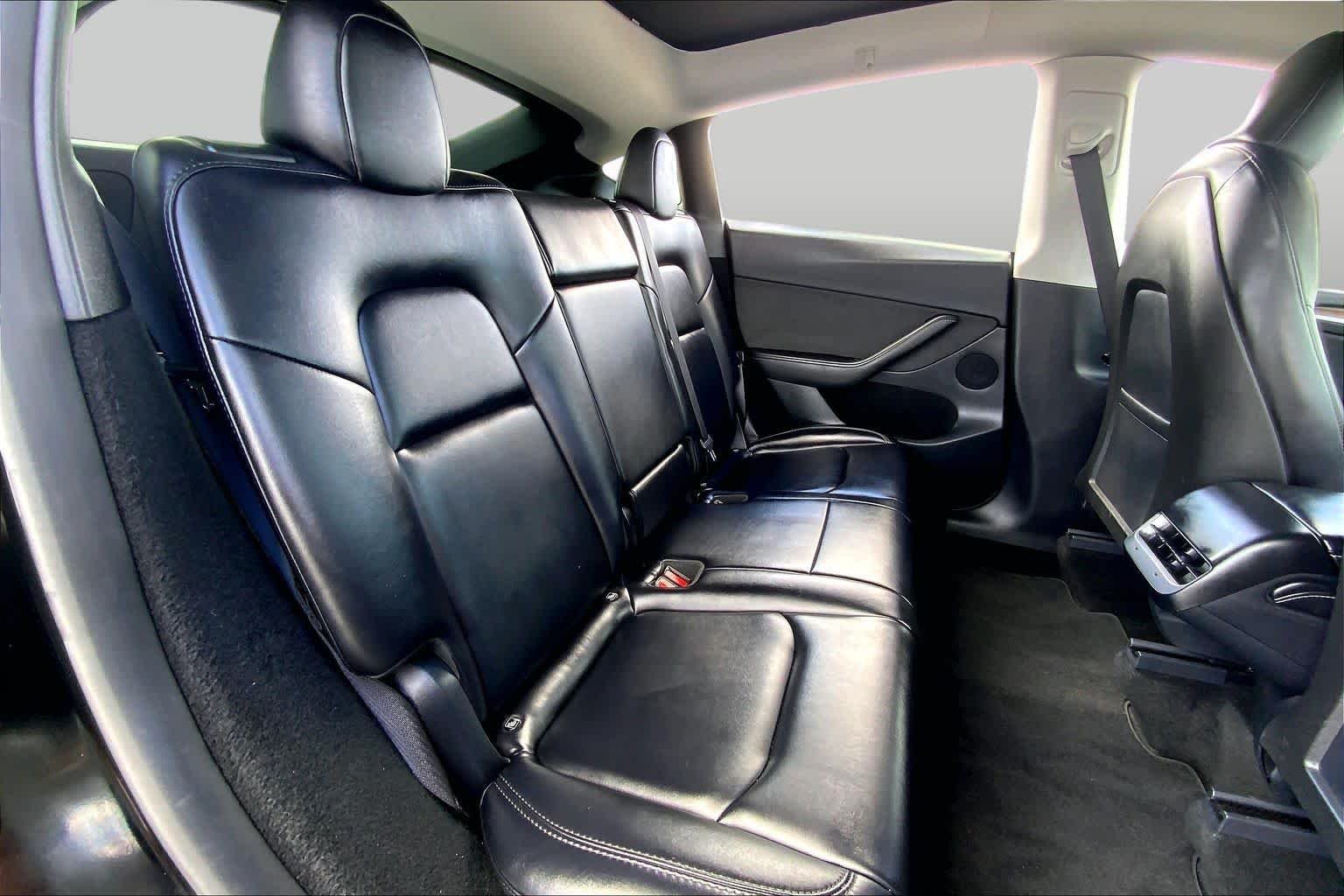 Used 2024 Solid Black Tesla  image 18