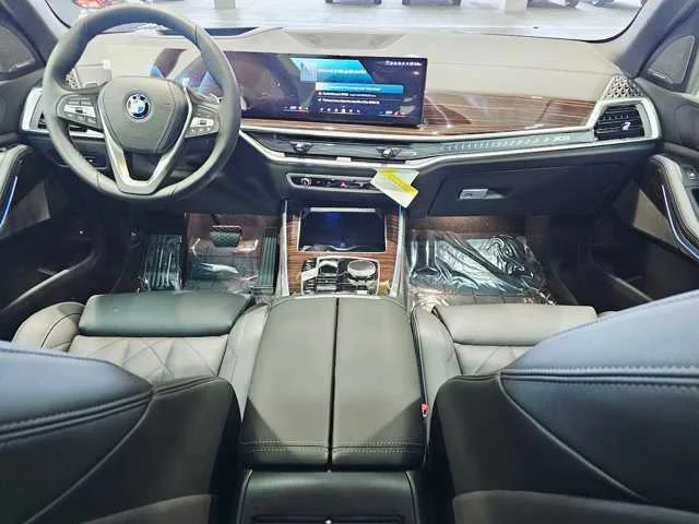 Used 2025 Black Sapphire Metallic BMW xDrive50e image 10