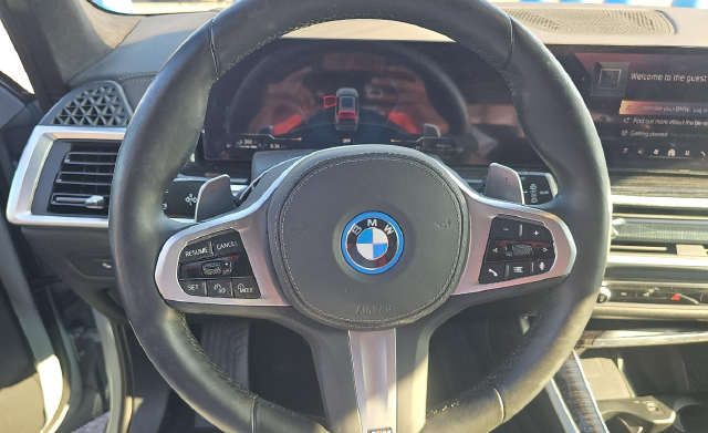 Used 2026 Gray Metallic BMW xDrive50e image 4