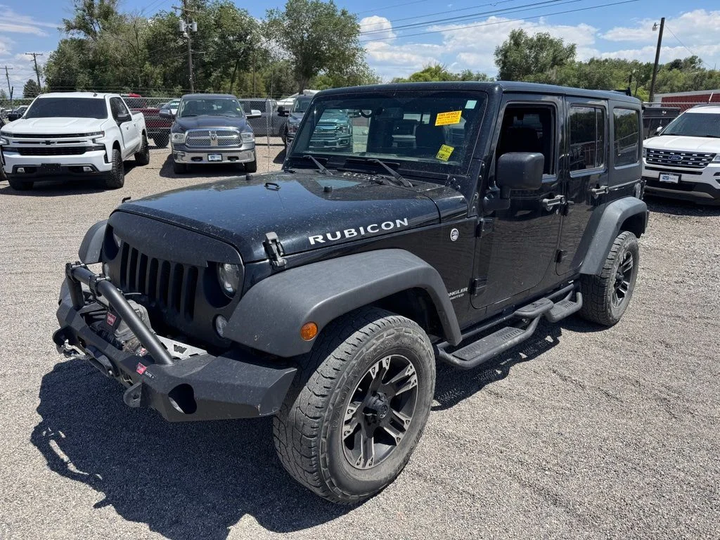 Used 2016 Jeep Wrangler Unlimited Rubicon with VIN 1C4BJWFG4GL191122 for sale in Delta, CO