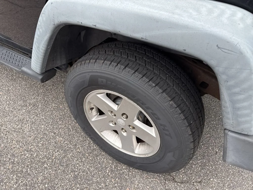 Used 2012 Black Jeep Unlimited Sport image 16