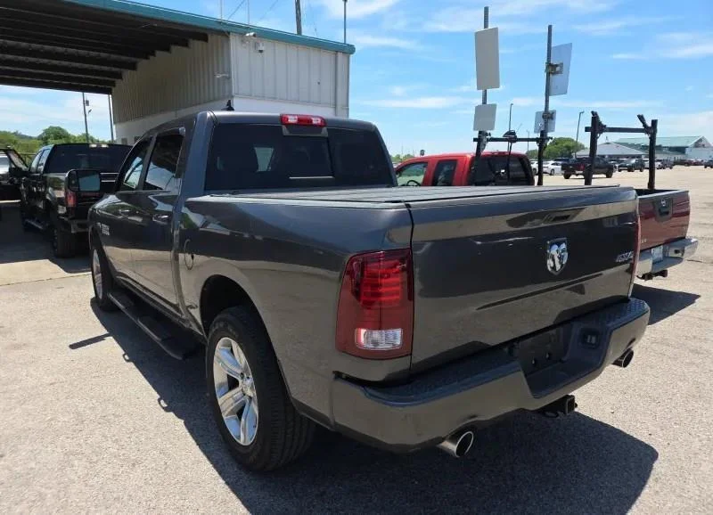 Used 2017 Granite Crystal Metallic Clearcoat Ram Sport image 4