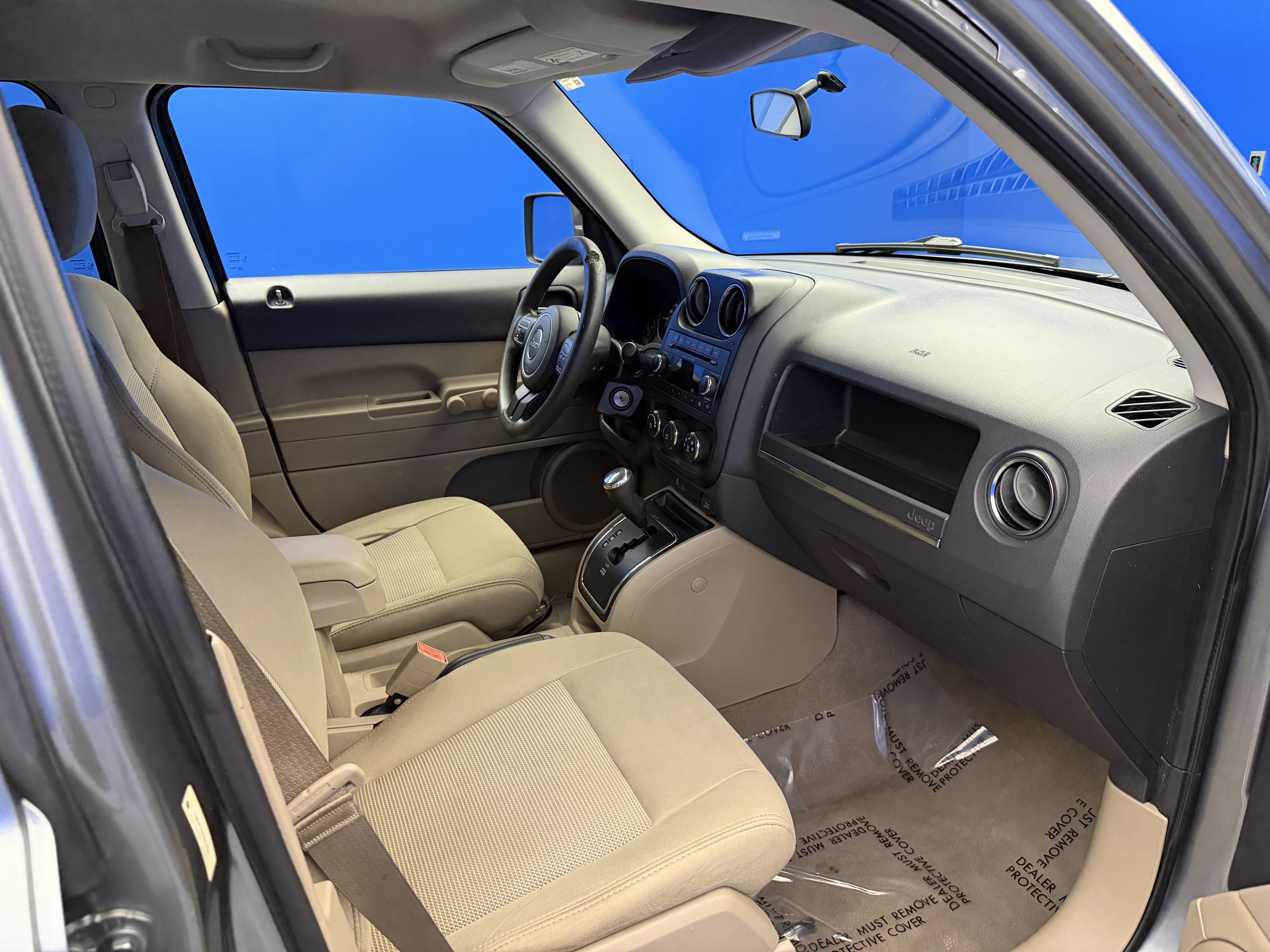 Used 2012 Mineral Gray Metallic Jeep Sport image 21