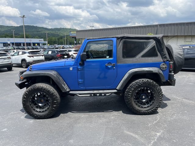 Used 2014 Flame Red Clearcoat Jeep Sport image 4