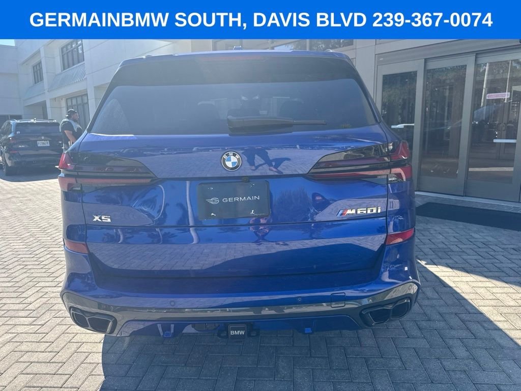 Certified Used 2026 Blue Metallic BMW M60i image 4