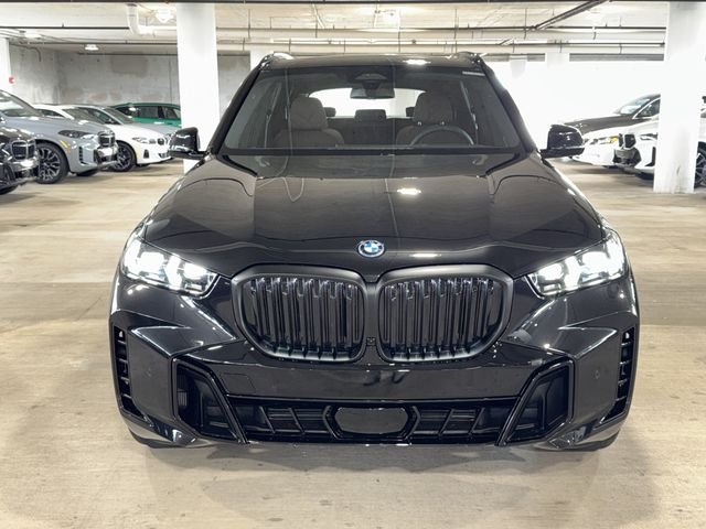 New 2026 Black Sapphire Metallic BMW xDrive50e image 2