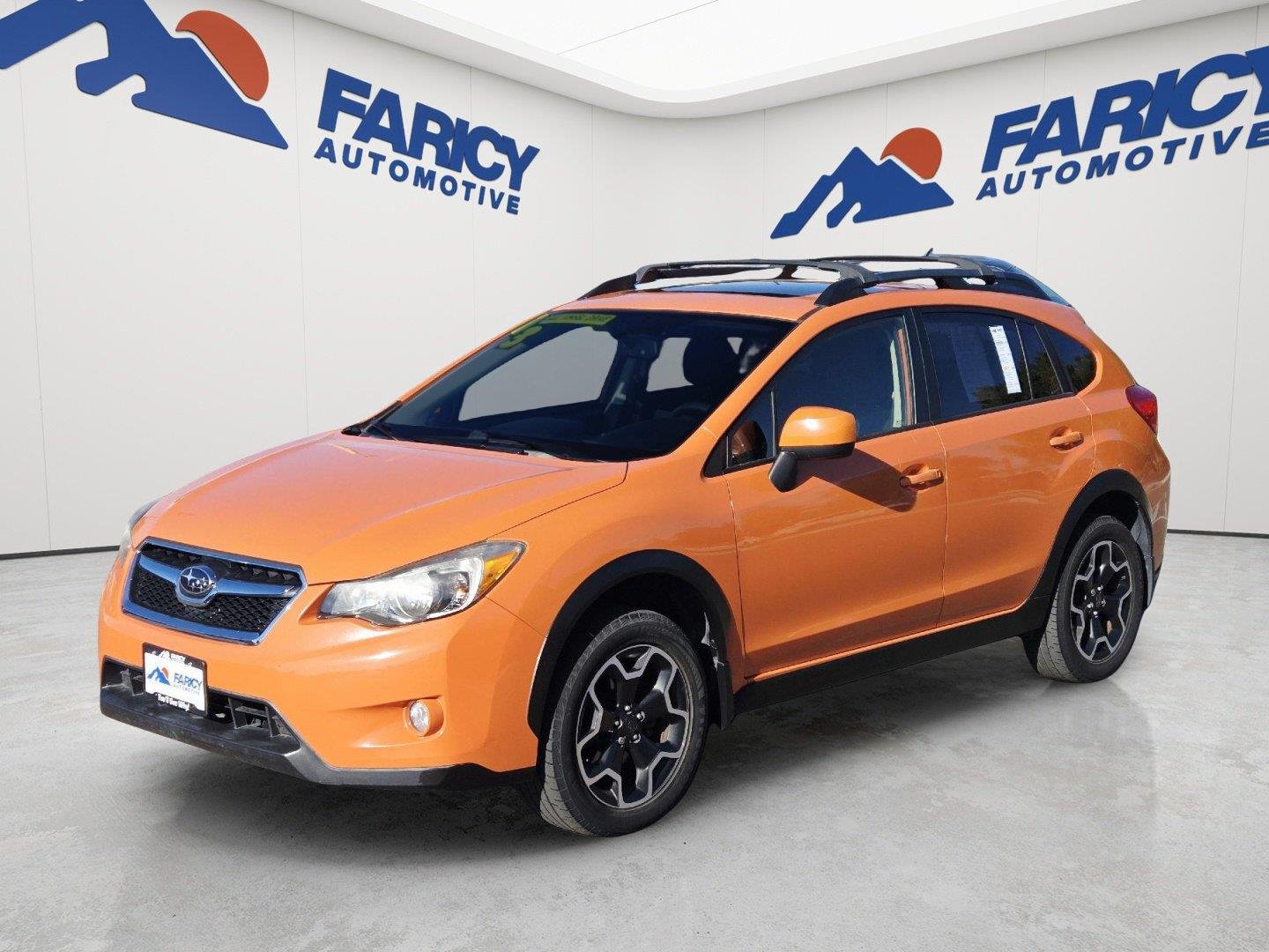 Used 2013 Tangerine Orange Pearl Subaru Premium image 1