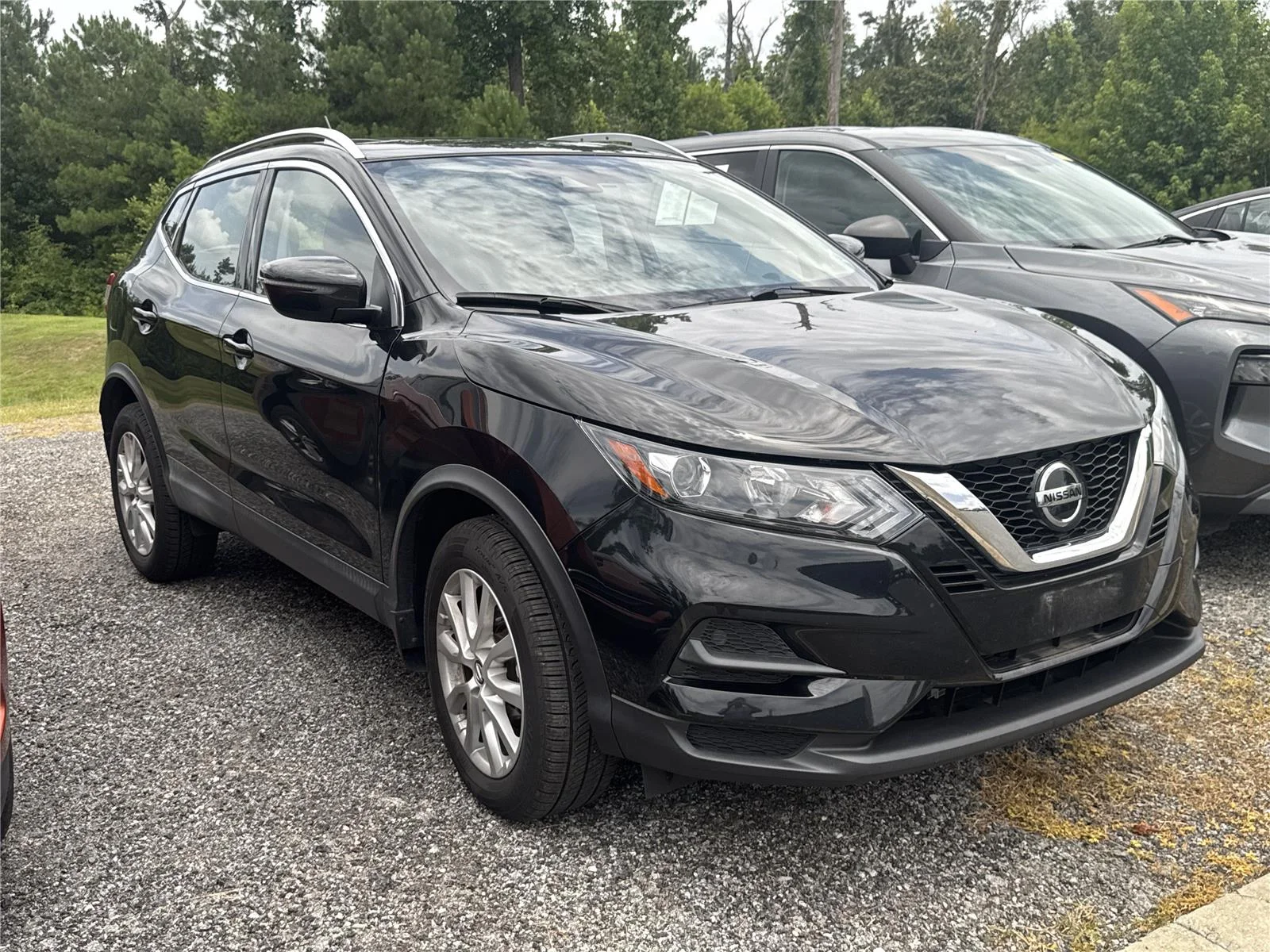 Used 2020 Magnetic Black Pearl Nissan S image 1