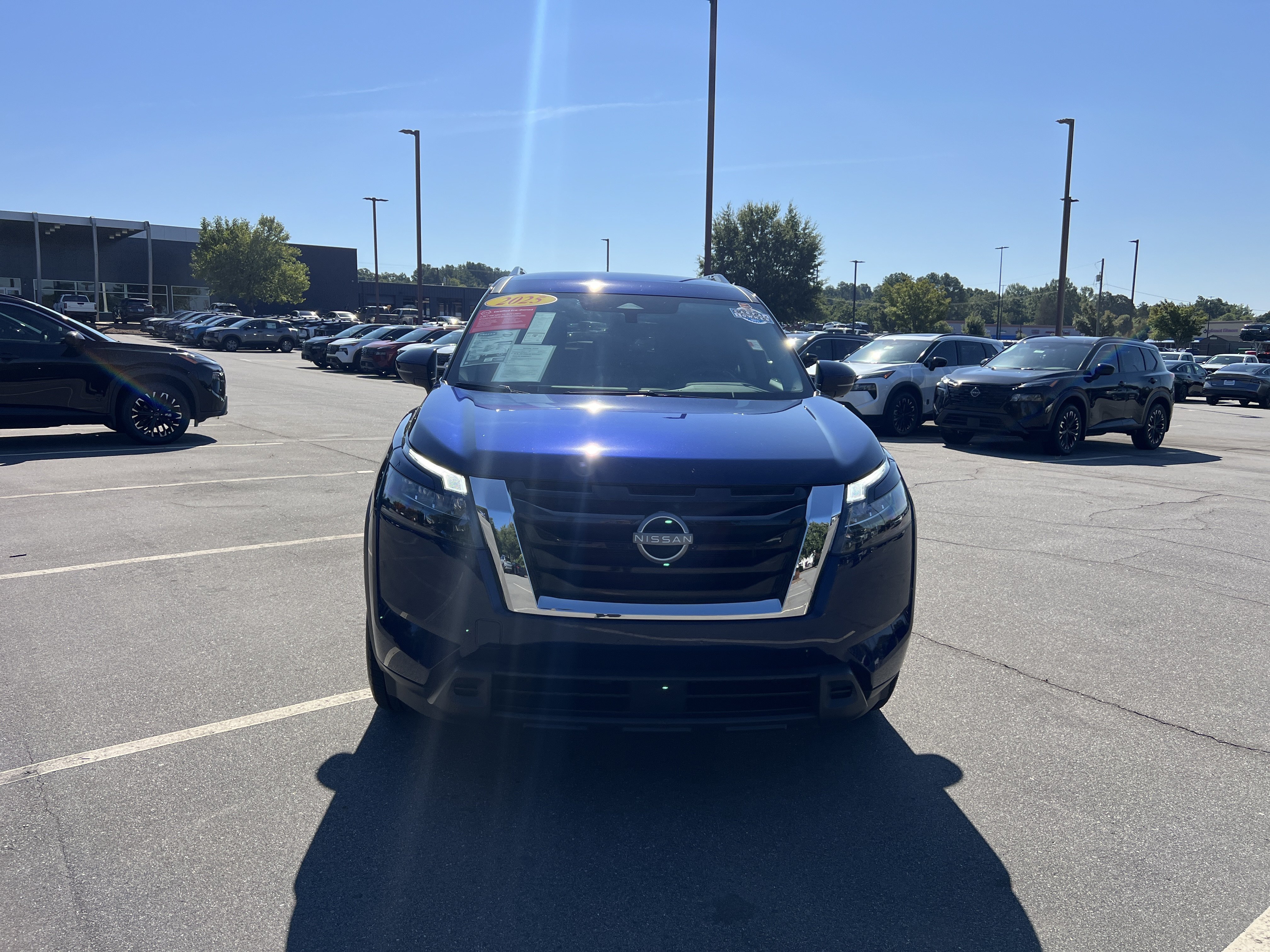 Used 2025 Deep Ocean Blue Pearl Nissan SV image 2