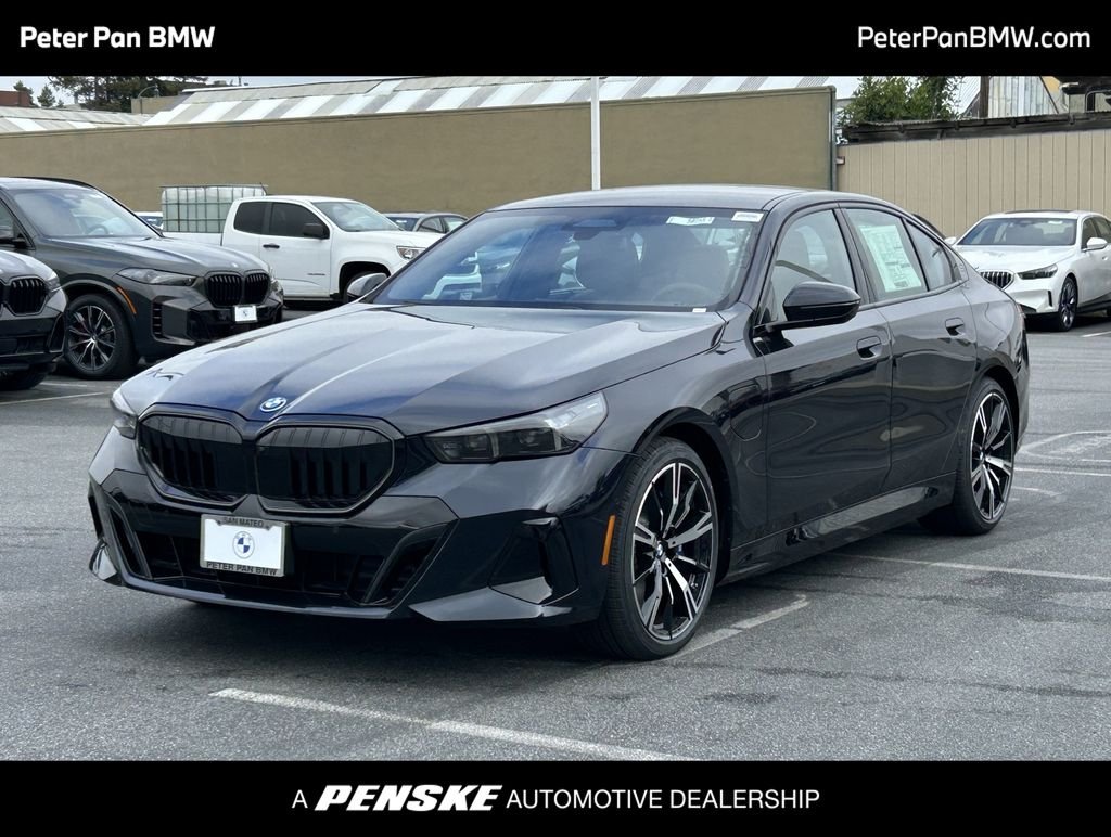 2026 BMW 5 Series 550e xDrive Sedan's photo
