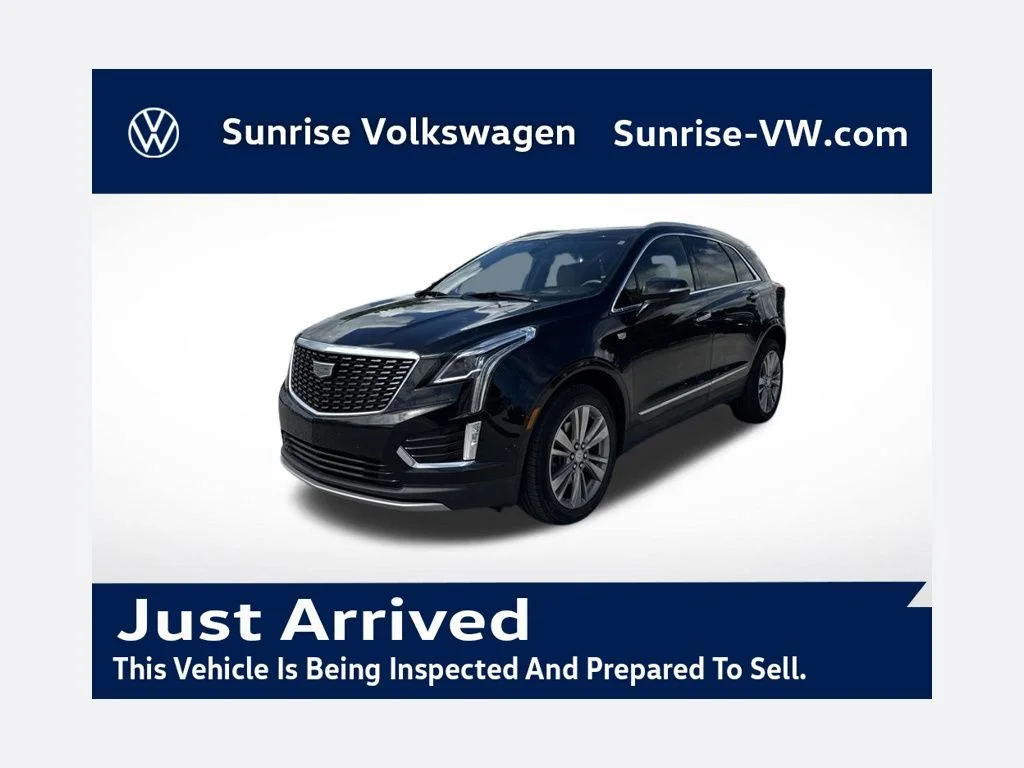 Used 2024 Black Metallic Cadillac Premium Luxury image 1