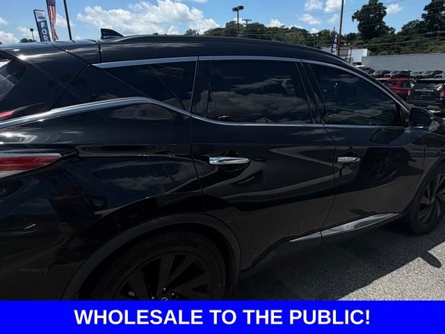 Used 2017 Magnetic Black Nissan Platinum image 1