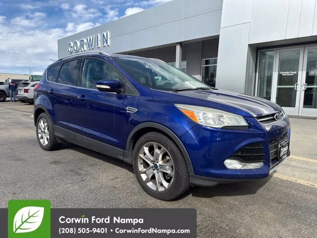 Used 2014 Blue Ford Titanium image 1