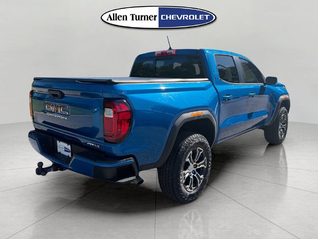 Used 2023 DYNAMIC BLUE METALLIC GMC 4WD AT4 image 4