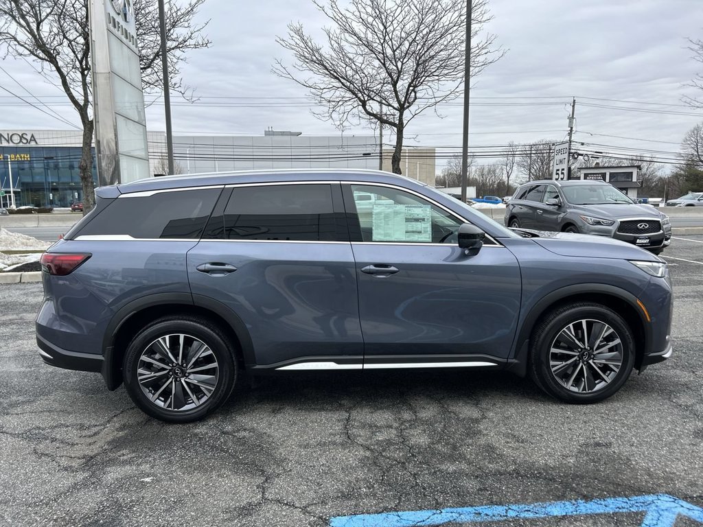Certified Used 2026 Blue INFINITI LUXE image 9