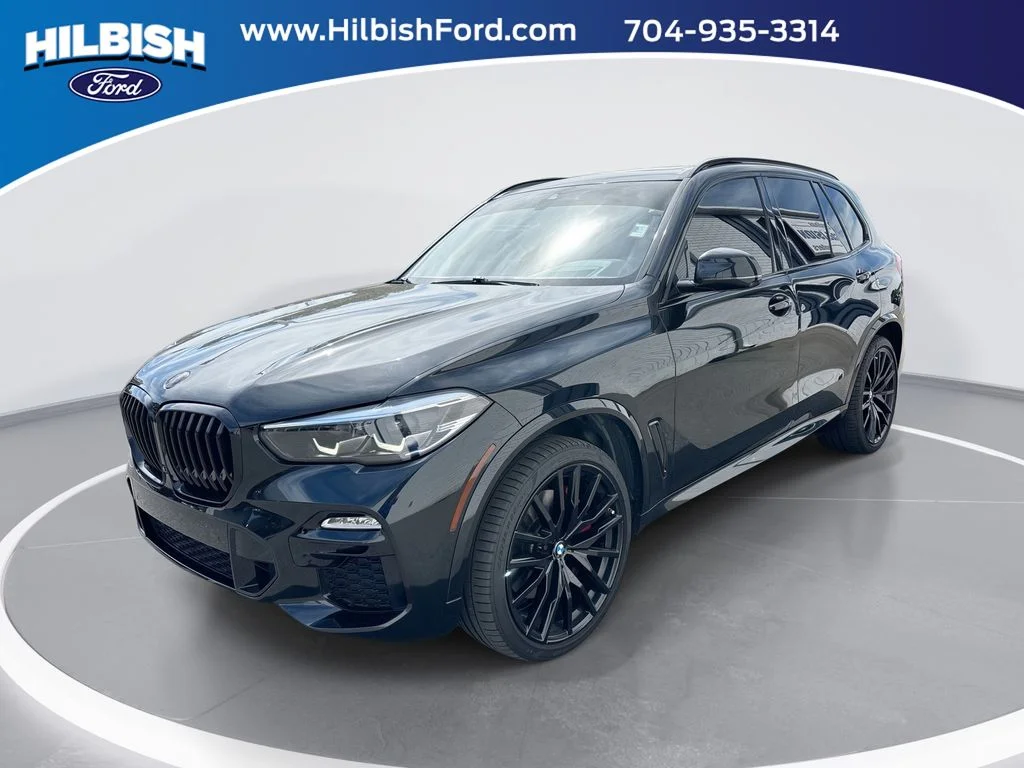 Used 2021 Black BMW xDrive40i image 1