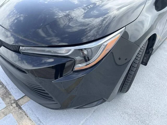 Used 2025 Midnight Black Metallic Toyota LE image 8