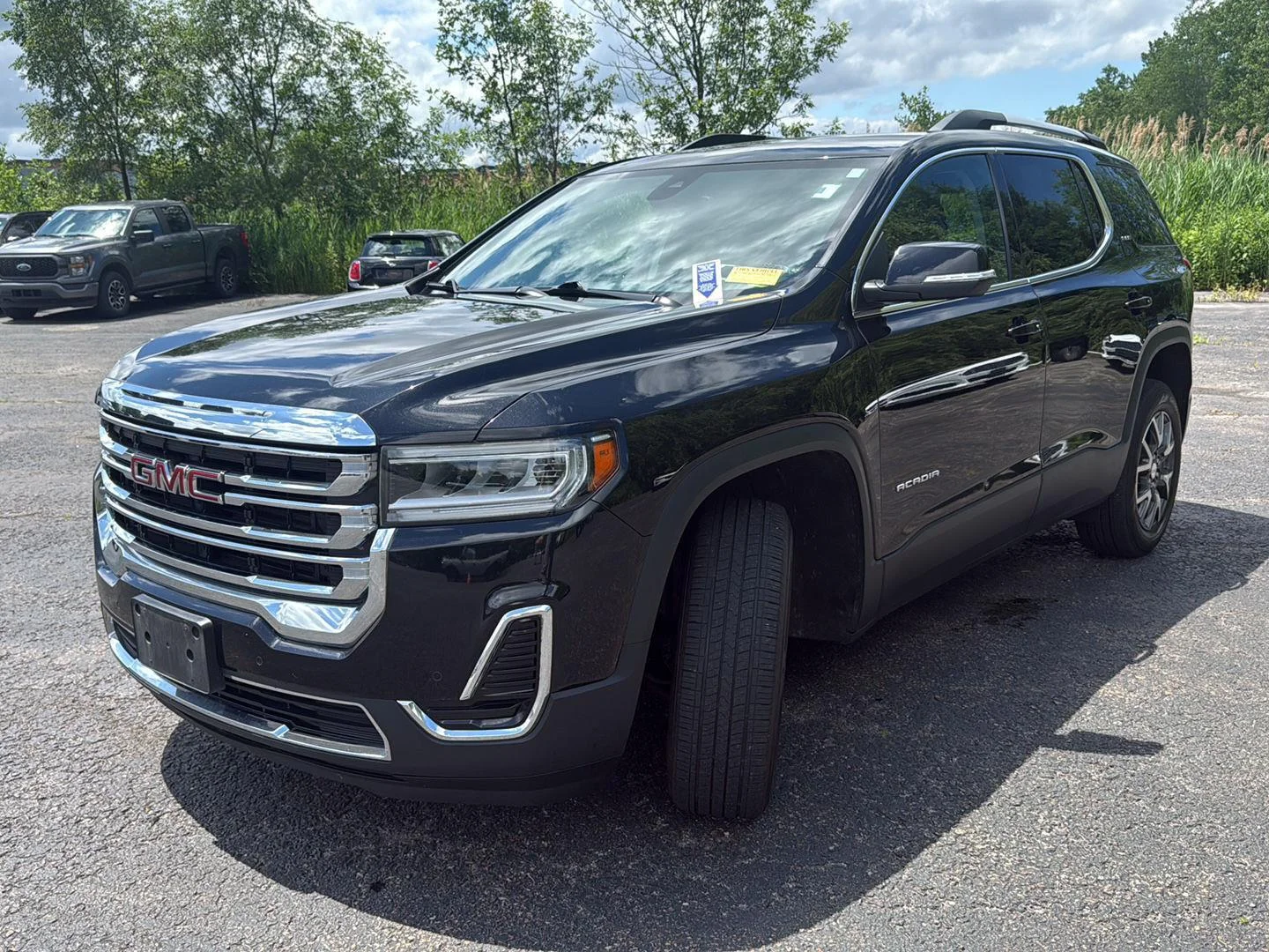Used 2022 Ebony Twilight Metallic GMC SLE image 7