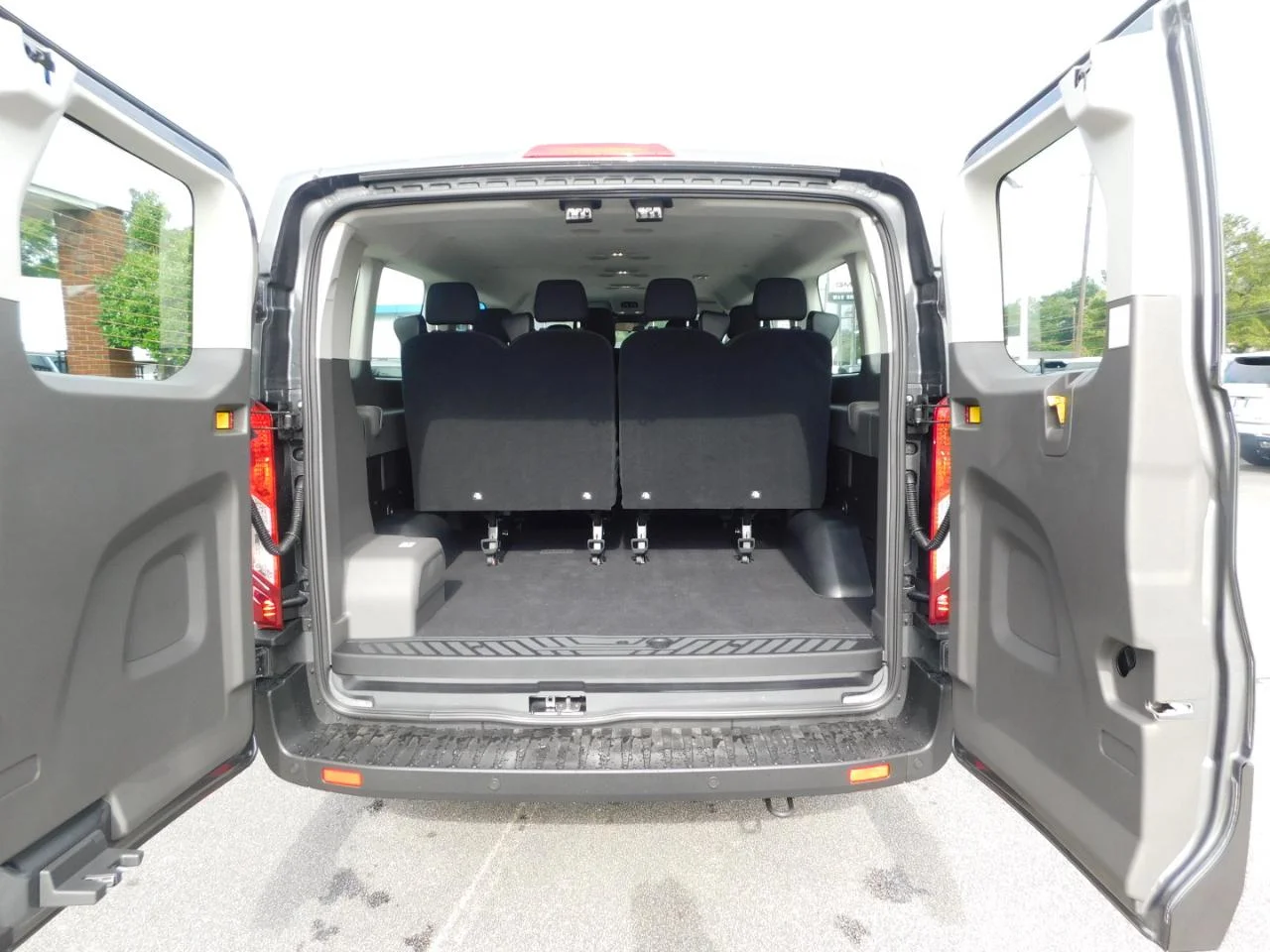 New 2026 Carbonized Gray Metallic Ford Passenger Van XLT image 19
