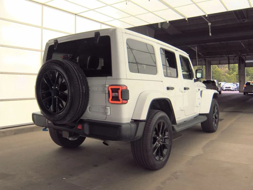 Used 2023 White Jeep Sahara 4xe image 2