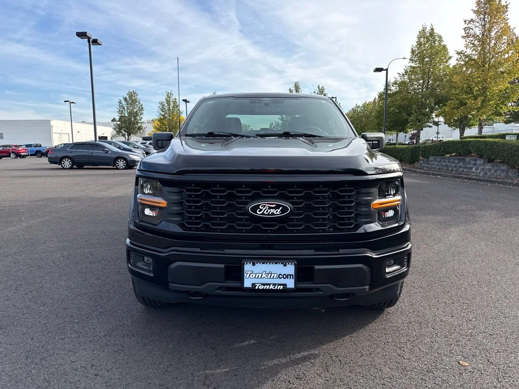 Used 2025 Agate Black Metallic Ford STX image 2