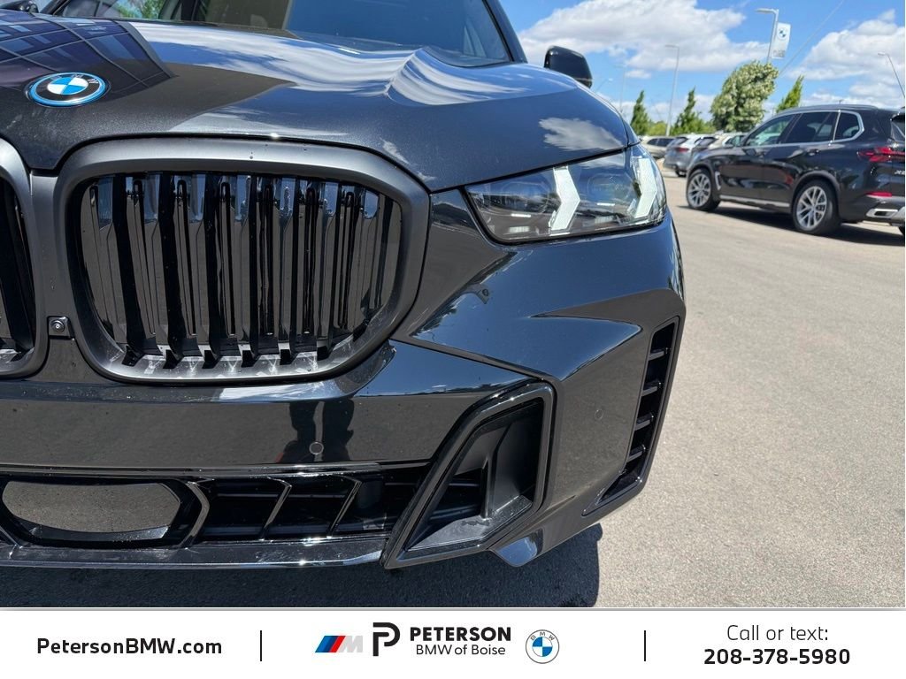 New 2026 Black Sapphire Metallic BMW xDrive50e image 43