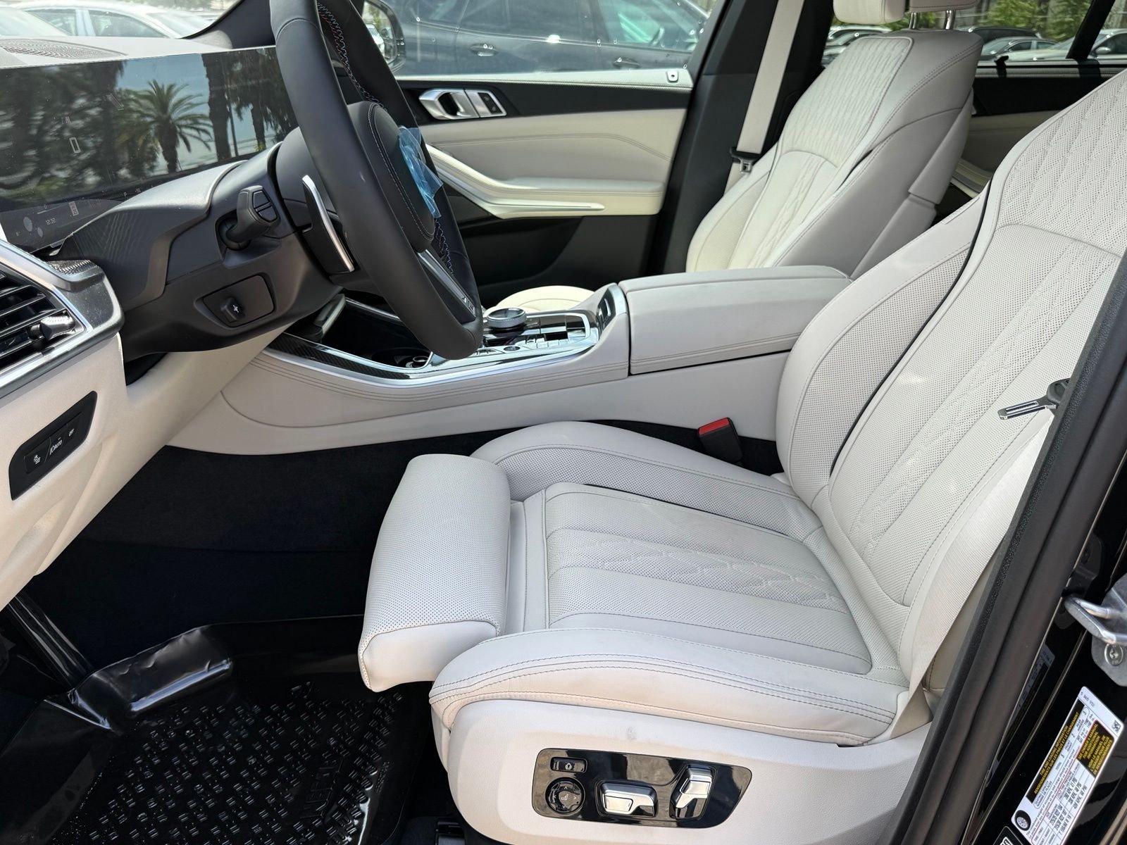 New 2026 Black Sapphire Metallic BMW M60i image 21