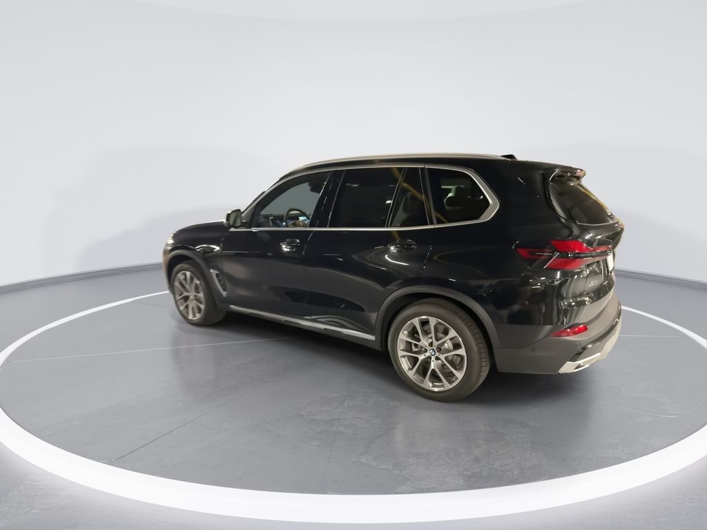 New 2026 Black Sapphire Metallic BMW xDrive50e image 6