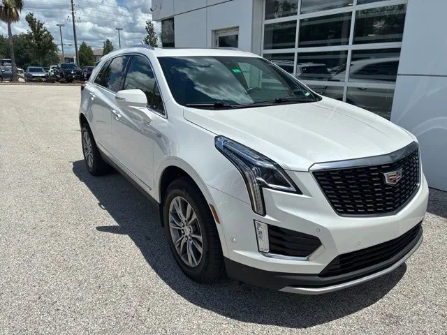 Used 2023 White Cadillac Premium Luxury image 1