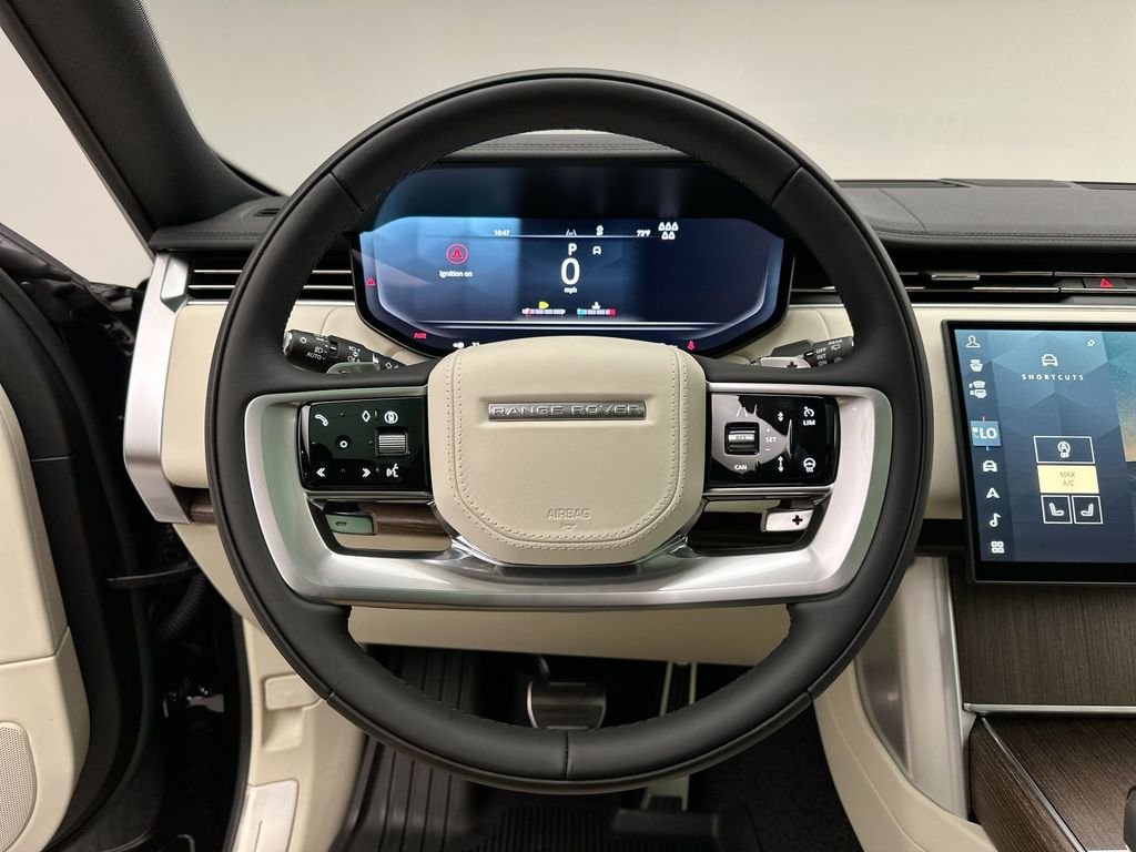 New 2027 Santorini Black Metallic Land Rover SE image 14