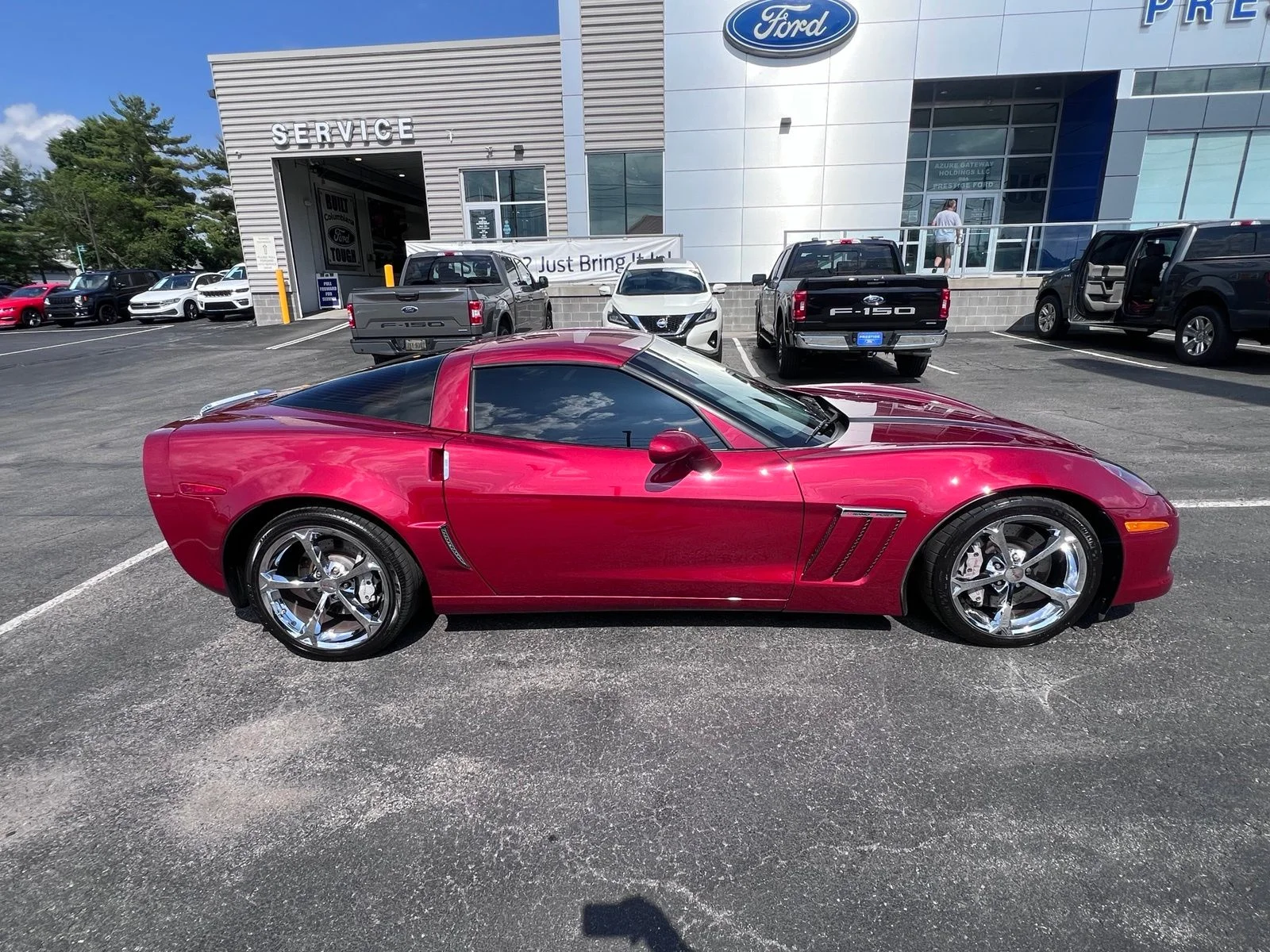 Used 2012 Crystal Red Tintcoat Chevrolet Grand Sport image 10