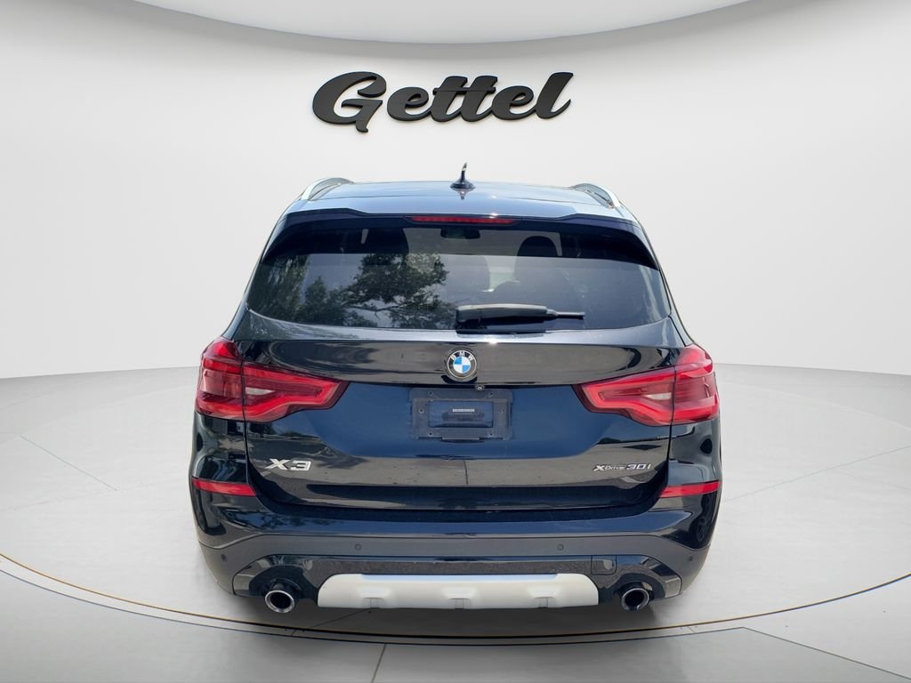Used 2021 Black BMW xDrive30i image 4
