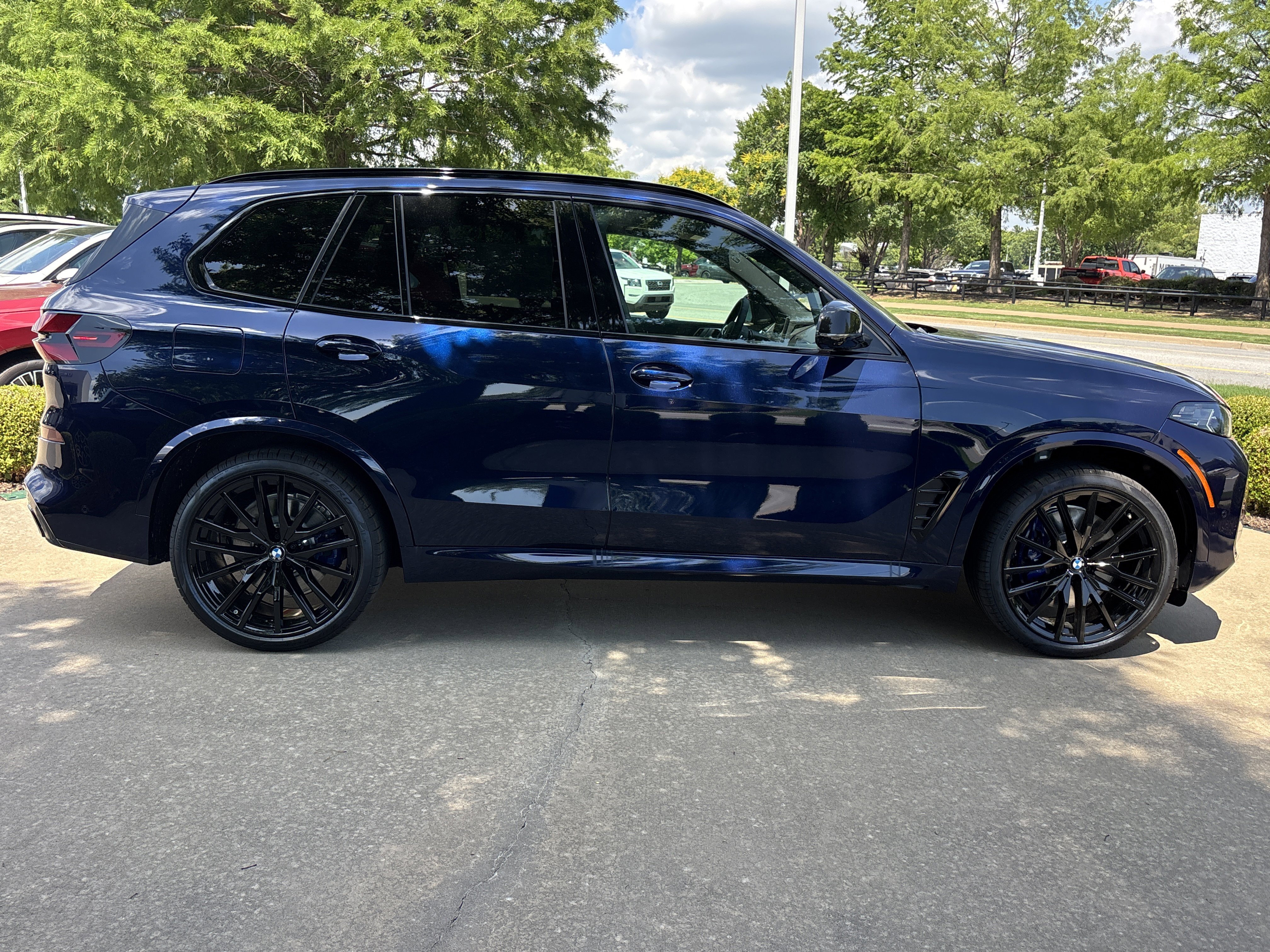 New 2026 0C3Z Tanzanite Blue II Metallic BMW M60i image 12