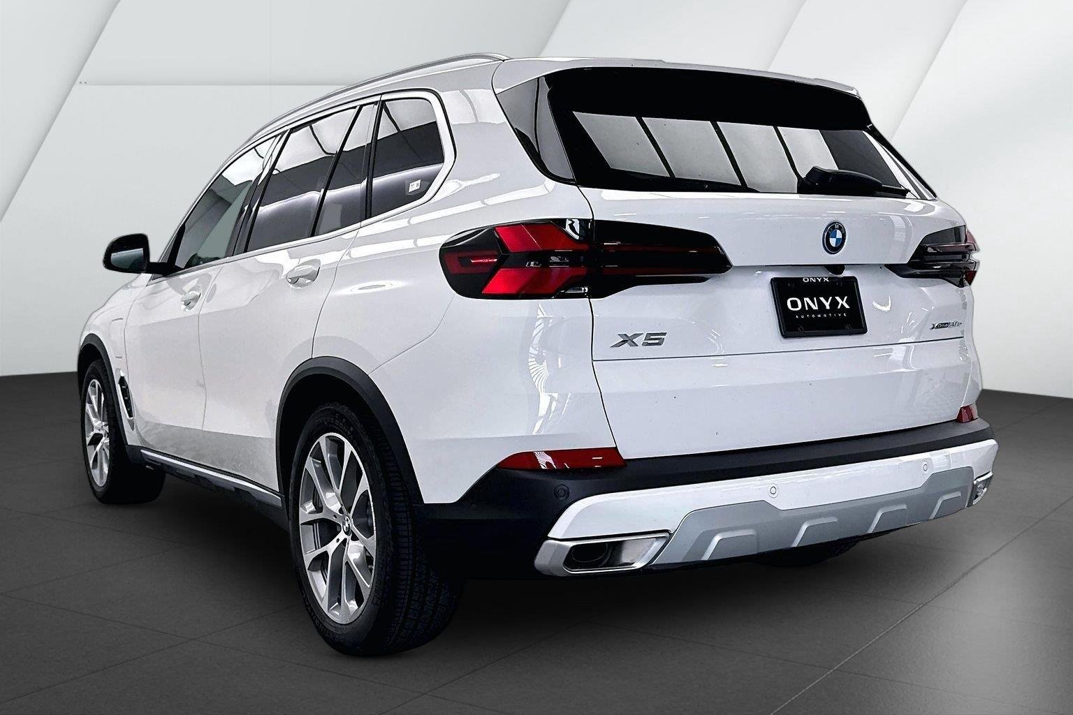 New 2026 Alpine White BMW xDrive50e image 9