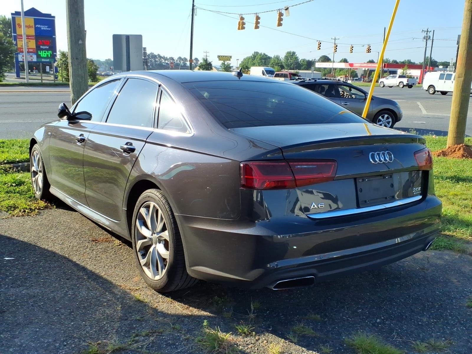 Used 2017 Oolong Gray Metallic AUDI PREMPLS image 4