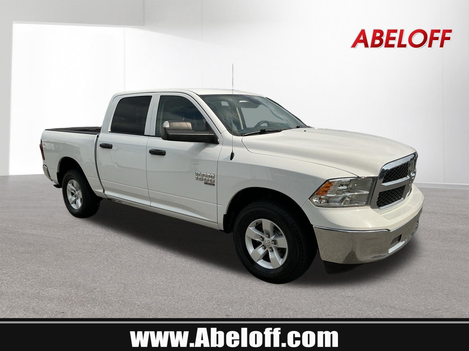 Used 2023 Bright White Clearcoat Ram SLT image 1