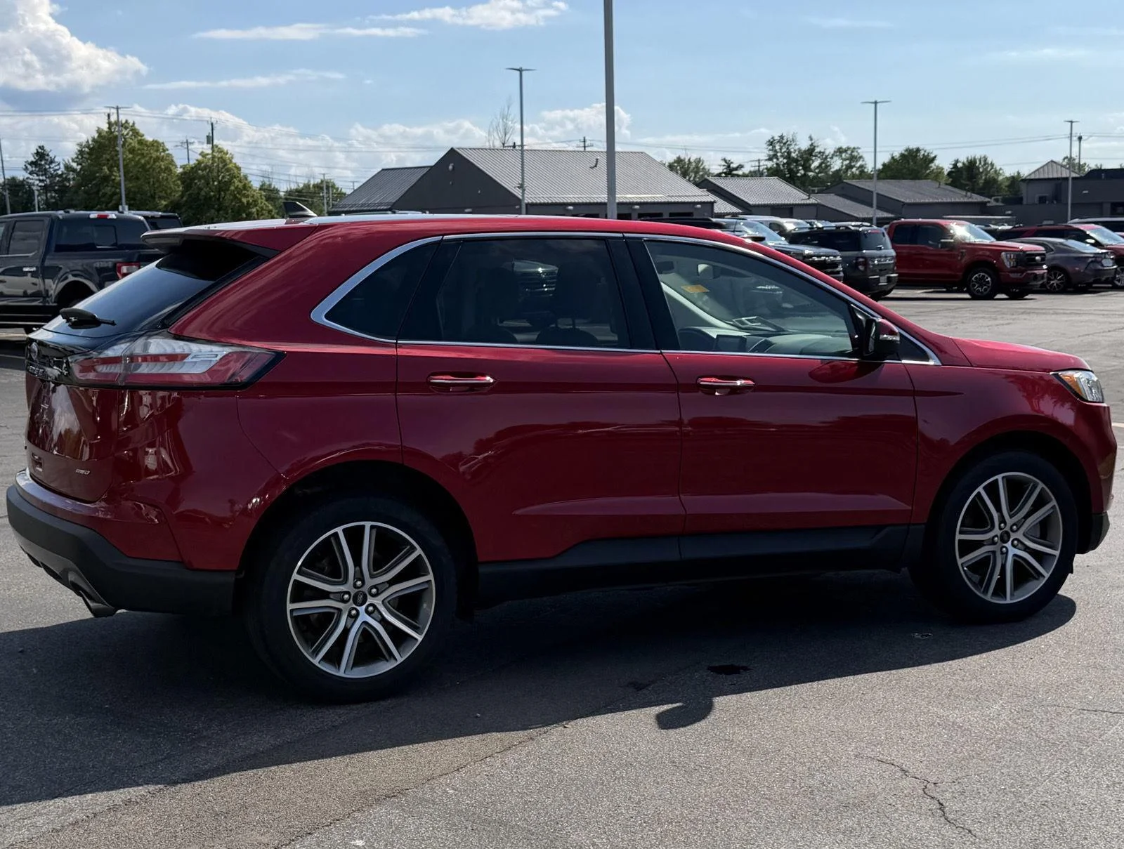 Used 2023 Rapid Red Metallic Tinted Clearcoat Ford Titanium image 4