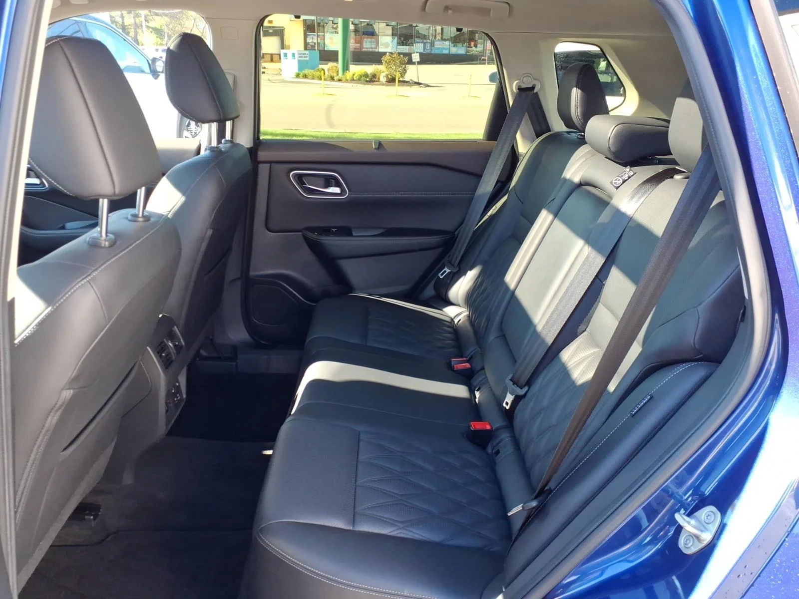 Used 2023 Caspian Blue Metallic Nissan Platinum image 13