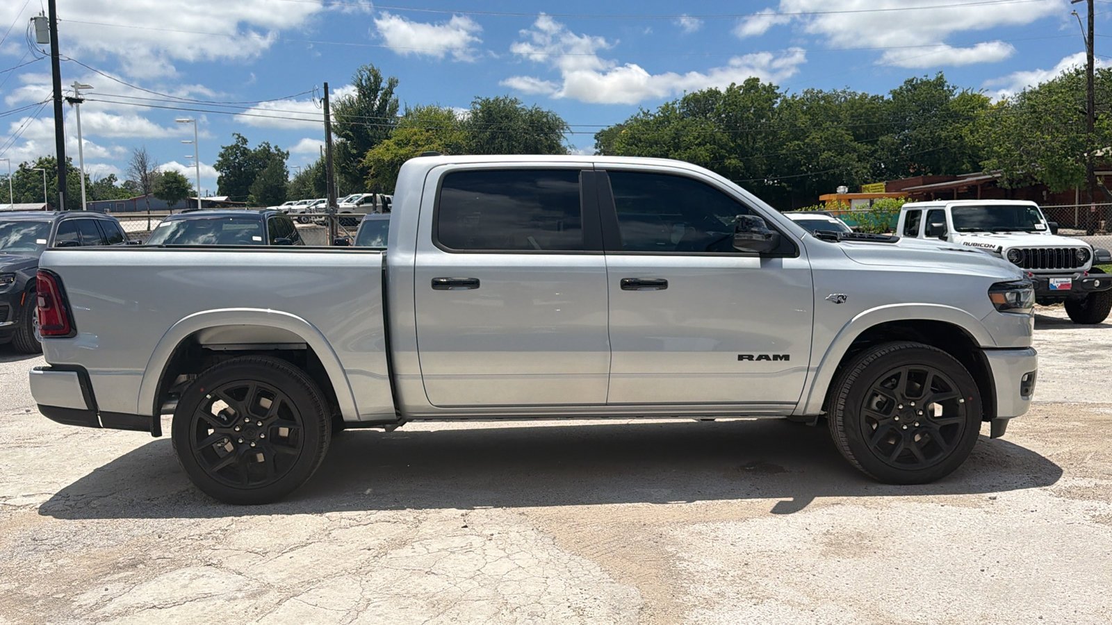 New 2026 Silver Zynith Exterior Paint RAM Laramie image 4
